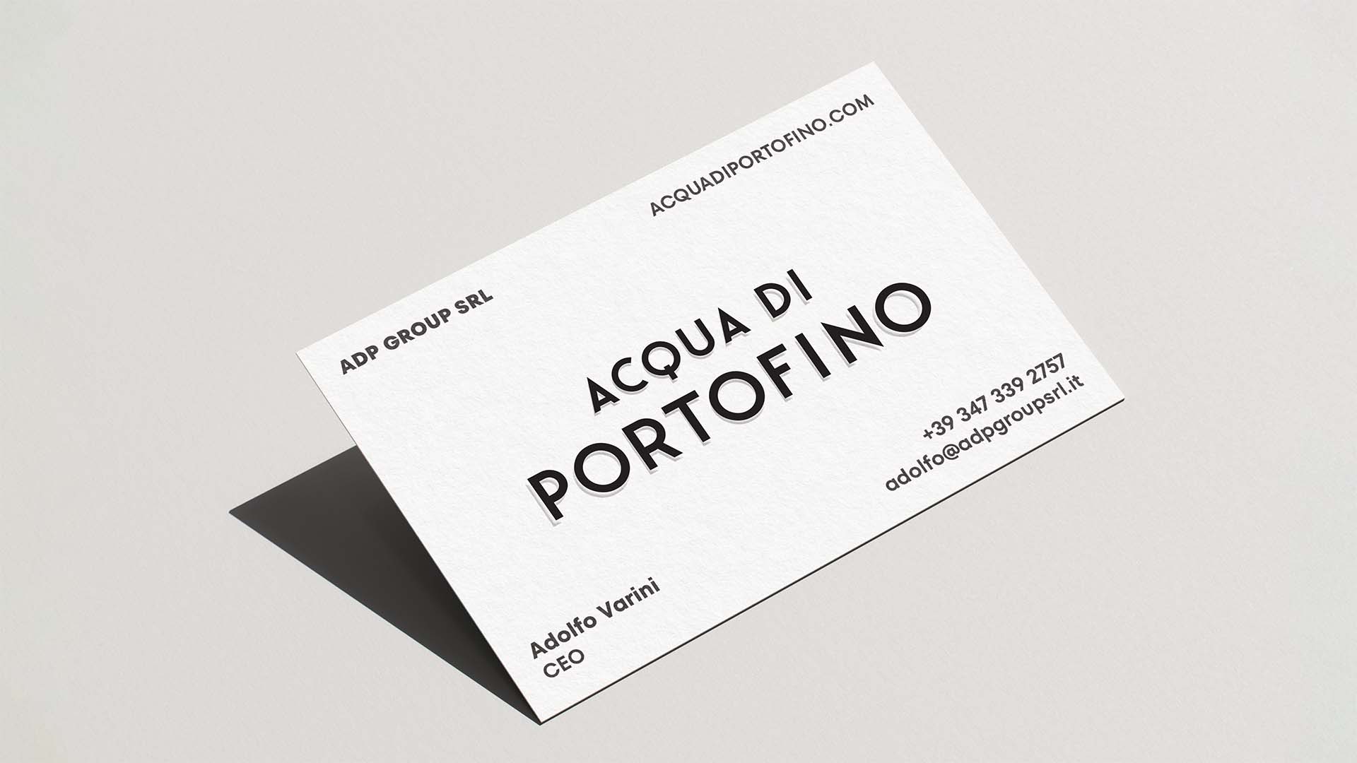 Minimalist executive business card mockup on cotton paper featuring bold black typography.