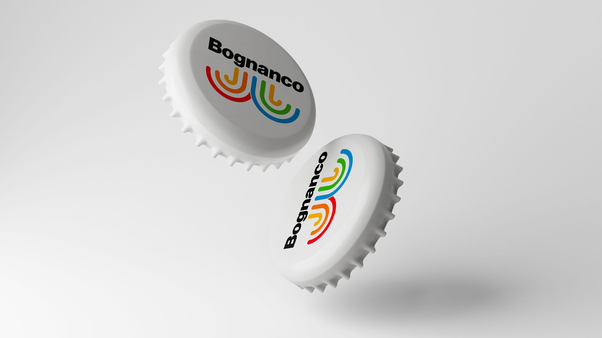 Floating white metal bottle crown caps printed with Bognanco logotype and rainbow fountain arches.